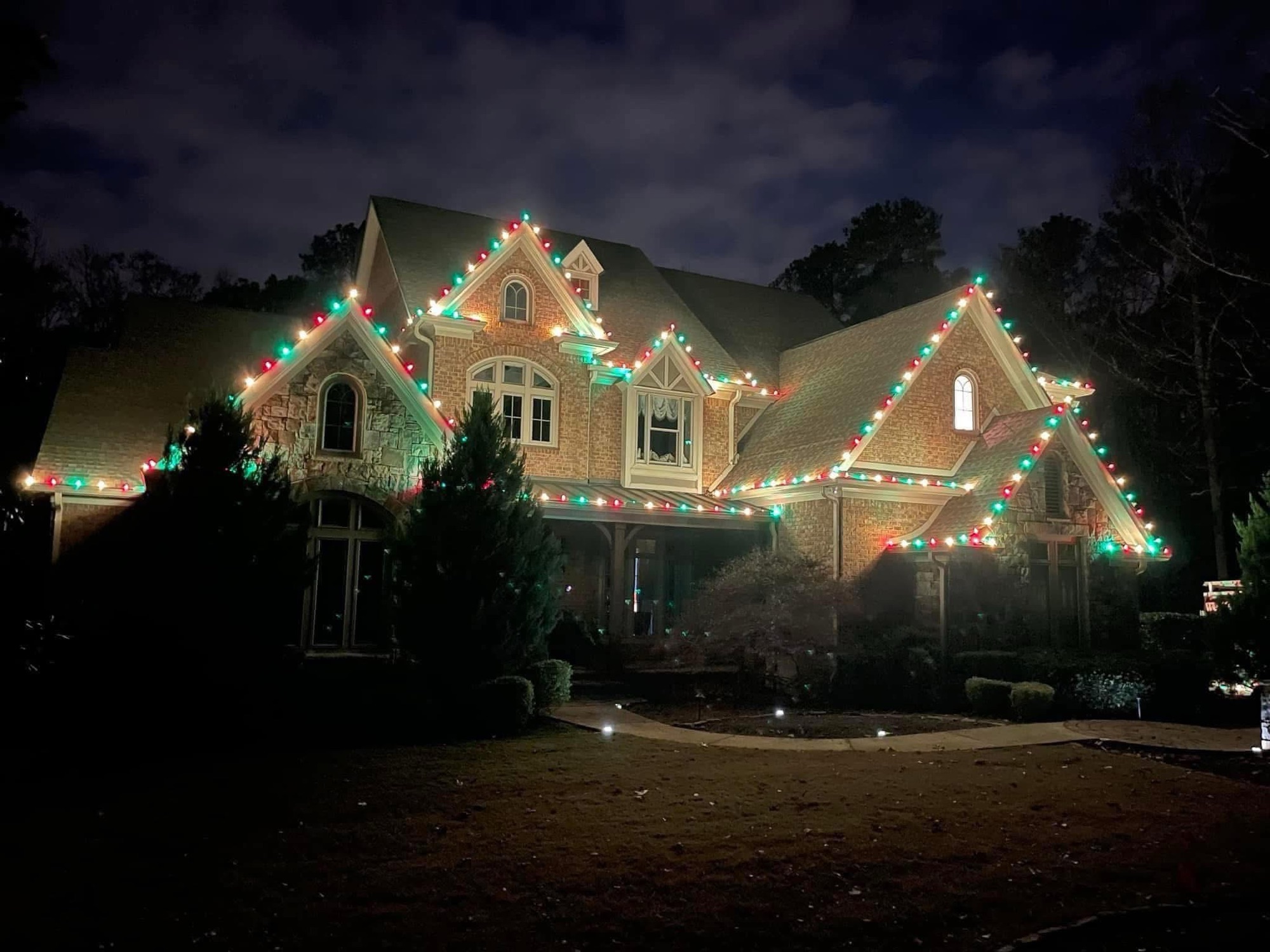 Brick estate and driveway Christmas lights